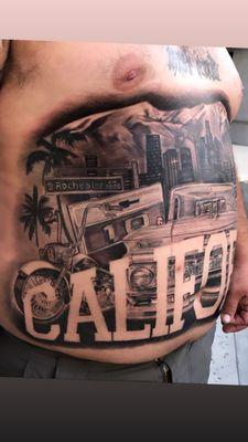 Large scale tattoo on stomach by Jay