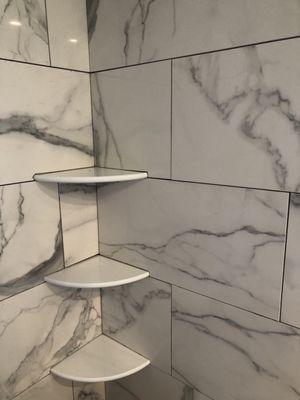 The beautiful porcelain tile and shelving from Island Flooring Plus in Riverhead.