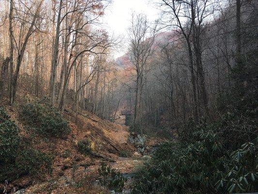 The view of the cabin from the waterfall