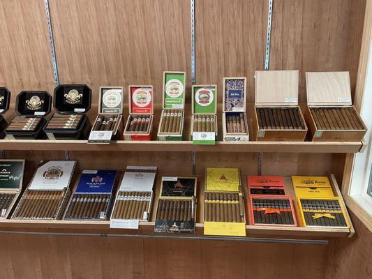 Cigars from Gran Habano, Aging Room, Montecristo, Macanudo, and H. Upmann.