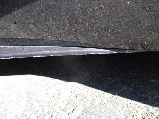 (Before) totally scraped up rocker panel. There was also a big scrape that cannot be seen in picture