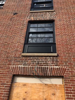 Marvin fiberglass windows installed in an Old Town Alexandria brick building.