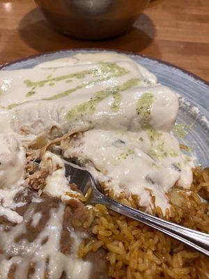 Chicken enchiladas rice and beans