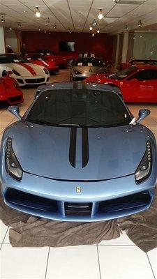 Custom stripes on a new Ferrari.