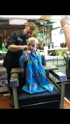 All Kids, Students & Military $10.00 Haircuts