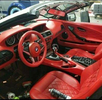 Bmw red interior we did seats with diamond Design, Dashboard, Door panels.