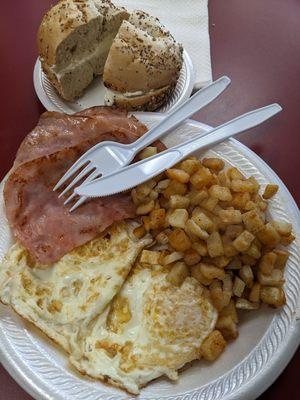 Two egg breakfast with everything bagel.