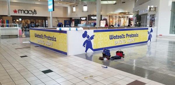 Temporary barricade graphics for retail environments