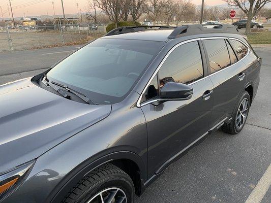 After tinting front driver and passenger windows (20%) and a strip at the top of the windshield (15%).