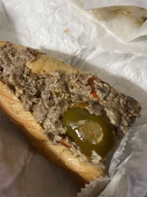 Cheesesteak with cooper sharp and hot peppers