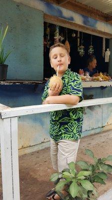 Dalton enjoying his first coconut!