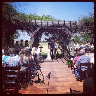 Ceremony beneath the arbor