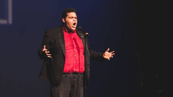 Vocal lesson student performing at recital