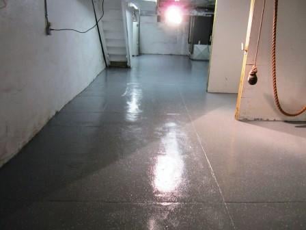 Epoxy floor coating Philadelphia. Finish coat of Grey decorative flake epoxy.