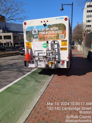 illegal parking on sidewalk and bike lane