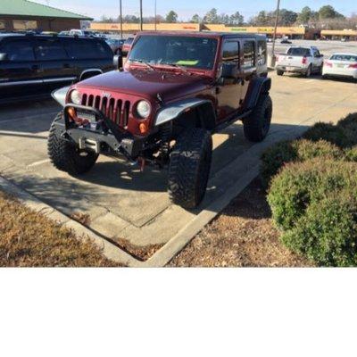 2007 Jeep Wrangler 4 door 6" lift, 37's, front/rear bumpers and 10000 lb warren winch. $20500