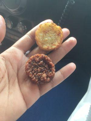 Burned hash brown next to a normal looking one. How can you serve this especially when you only give like 4 or 5 of them.