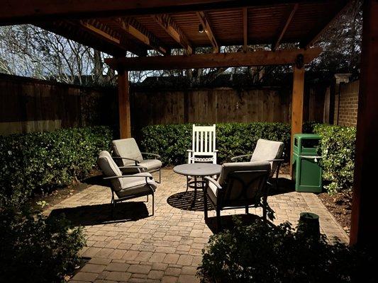 Common area with seating and dimmable light.