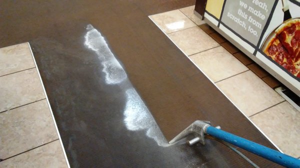 Commercial carpet cleaning is performed at a restaurant, with degreasing, sanitizing, disinfecting and deodorizing the carpet.