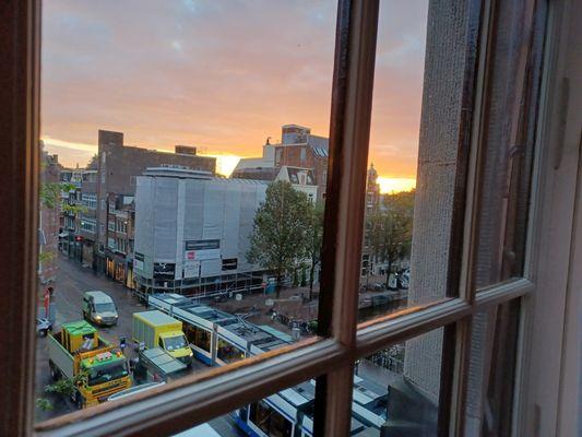 Sunset from our room in Amsterdam, right in the heart of the city.