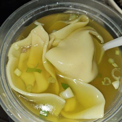 Bland wonton soup...basically yellow food coloring, water and scallions.