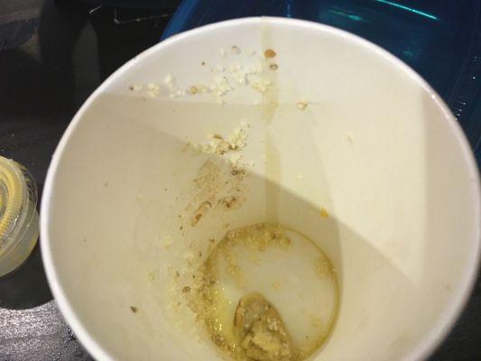 Amount of salt and fake butter left in my cup after tossing the majority of the bites