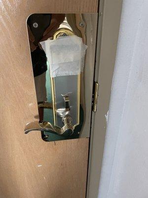 Tape covering the lock on the door