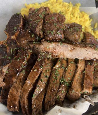 Steak and yellow rice