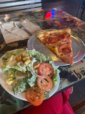 $8 lunch special. A slice of pizza, salad, and a drink