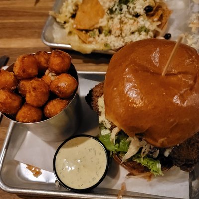 Chicken sandwich with sweet potato tots