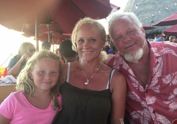 Tom Brooks Jr., his wife Leann Brooks, and their youngest daughter.