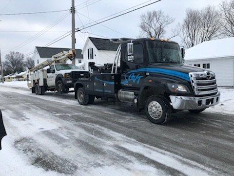 Bucket truck towing