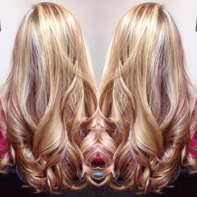 Blonde Balayage with Maroon lowlights.