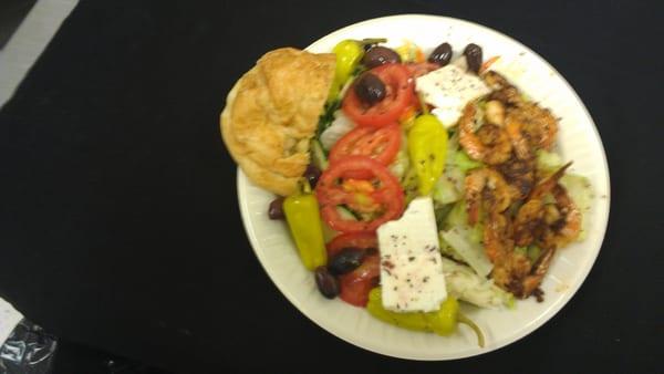 Greek Salad with Grilled Shrimp.  Top seller is Greek Salad with Blackened Salmon