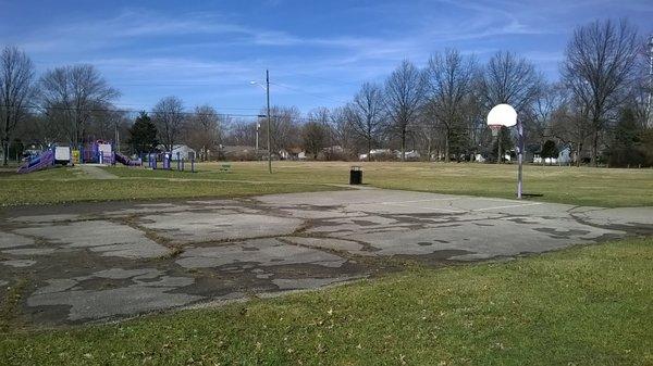 The park needs a lot of work on the basketball courts and some drainage for the playground