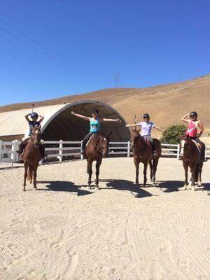 Group lesson in the outdoor jumping arena