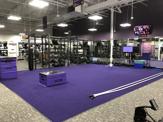 The functional fitness area or "purple turf" is were we host our group training sessions. It's set up with all the fun toys!