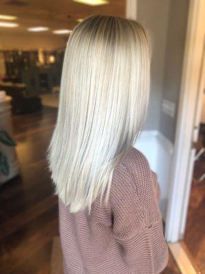 Icy highlights and soft root smudge by @hairbyarianahagen