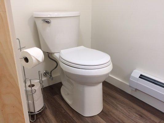 Picture 2 of "tiny" bathroom in a basement.