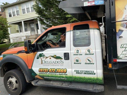 Worker moving truck after confronted about blocking my driveway.