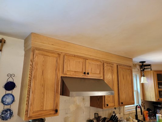 Trim installed over kitchen cabinets