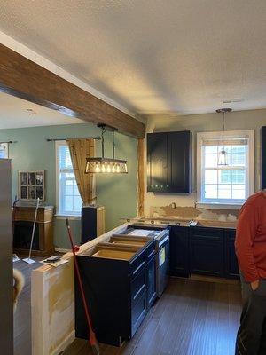 Wood beam and cabinet installation