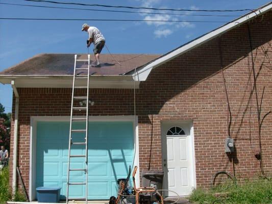 He uses safety equipment on the dangerous jobs.