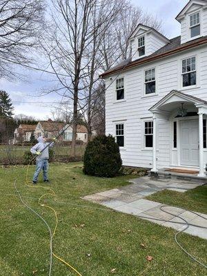 Cleaning 3rd floor windows safely from the ground with no ladder .