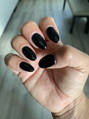 Short black almond nails.