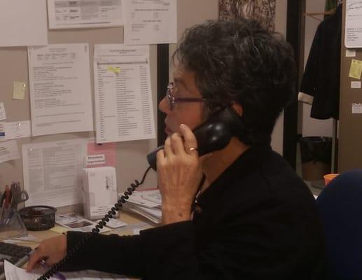 Mesa County RSVP SHIP (Senior Health Insurance Assistance Project) volunteer helping a Medicare eligible client.