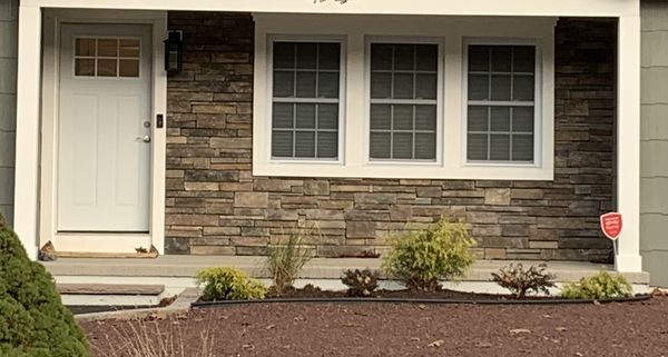 New doors and window. Azek trim. Front of house finished off with stacked stone