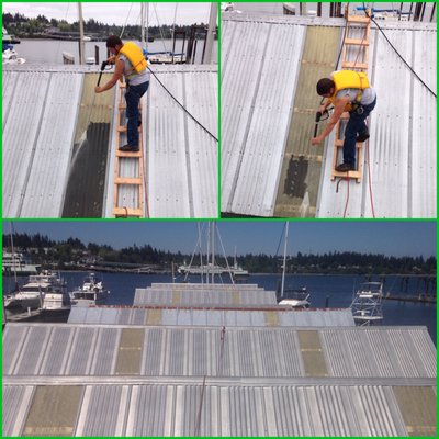 Pressure washing a boathouse roof, we're up for almost anything! Perks of the job - a beautiful day on the water!