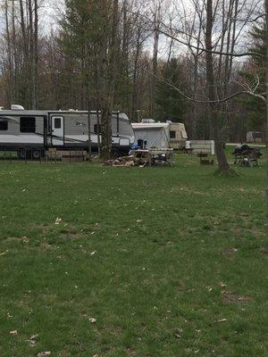 Seasonal site at Turtle Lake with junk all over, yapping dogs.