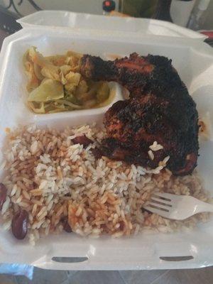 Jerk chicken,  red beans and rice,  cabbage